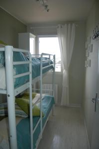 Giường trong phòng chung tại Appartement Vivacances côte d'Opale (Ste-Cécile)