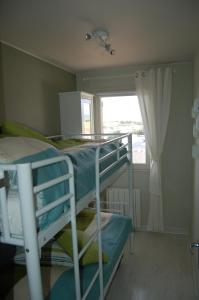A bed or beds in a room at Appartement Vivacances côte d'Opale (Ste-Cécile)