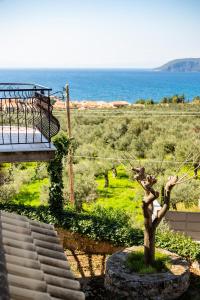 a view of the ocean from a house at Papanestoras Apartments in Kardamyli