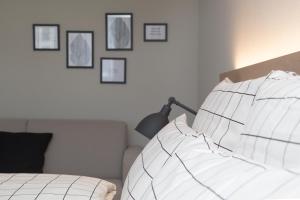 Tempat tidur dalam kamar di Businesshotel Forum Widnau