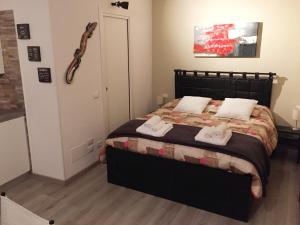 Posteľ alebo postele v izbe v ubytovaní Moro Dal Castel - Appartamento Al Moro