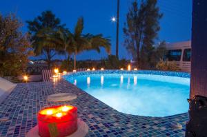 The swimming pool at or close to White & Blue