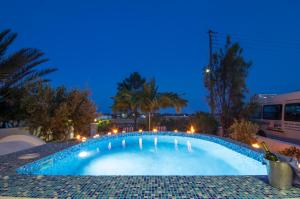 The swimming pool at or close to White & Blue