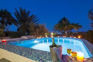 The swimming pool at or close to White & Blue