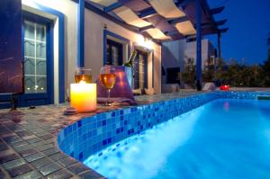 The swimming pool at or close to White & Blue