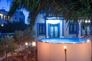 The swimming pool at or close to White & Blue