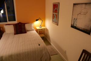A bed or beds in a room at Mancos Inn