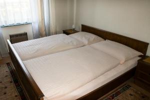 Katil atau katil-katil dalam bilik di Ferienwohnungen Unterpirker – Velden