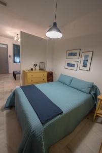 Postel nebo postele na pokoji v ubytování Alfareria Ocho