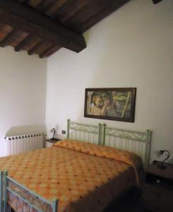 Katil atau katil-katil dalam bilik di Il Borgo di Montereggi