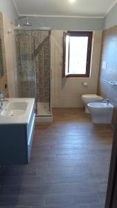 Kúpeľňa v ubytovaní B&B CASA MARTINA