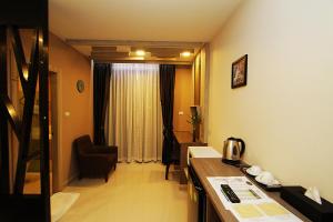 Μια τηλεόραση ή/και κέντρο ψυχαγωγίας στο The Contrast i Hotel
