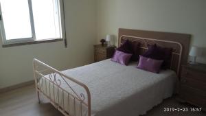Uma cama ou camas num quarto em Apartamento de Praia - Albufeira
