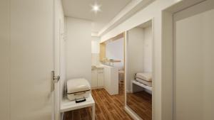 Koupelna v ubytování Hotel Erma