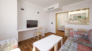 TV a/nebo společenská místnost v ubytování Hotel Erma