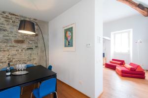 Зона вітальні в Antica Via Volta - The House Of Travelers