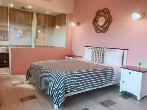 Postel nebo postele na pokoji v ubytování Taroko Mountain View B&B