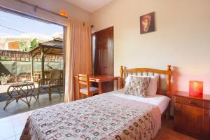 Кровать или кровати в номере L'Oiseau de L'Ocean Tourist Residence