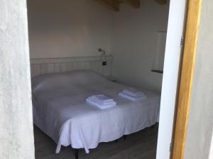 Posteľ alebo postele v izbe v ubytovaní Rifugio Dalco