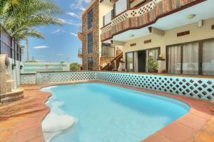 Бассейн в L'Oiseau de L'Ocean Tourist Residence или поблизости