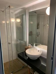 A bathroom at Blue Elegance City Center Heraklion Apartment
