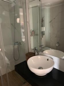 A bathroom at Blue Elegance City Center Heraklion Apartment