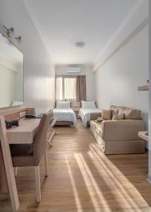 Postel nebo postele na pokoji v ubytování Attalos Hotel