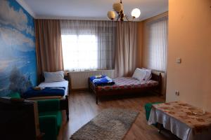 Postel nebo postele na pokoji v ubytování Delieva House