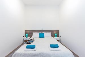 Posteľ alebo postele v izbe v ubytovaní Julia apartments