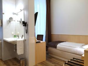 Voodi või voodid majutusasutuse Hotel Zipser toas