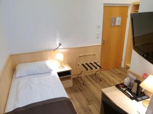 Voodi või voodid majutusasutuse Hotel Zipser toas