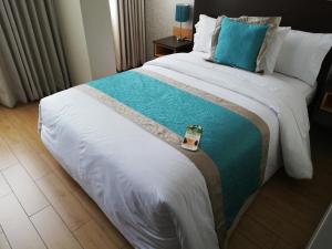 Cama ou camas em um quarto em Hotel Diamond Lima