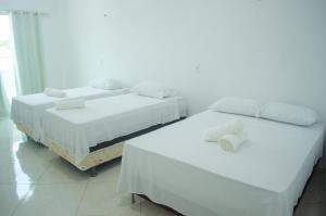 Cama o camas de una habitación en Pousada Central