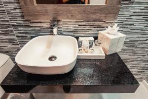 Um banheiro em Hotel Diamond Lima