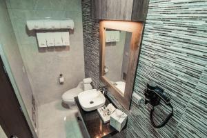 Um banheiro em Hotel Diamond Lima