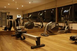 a gym with several treadmills and exercise machines at Riff Hikkaduwa in Hikkaduwa