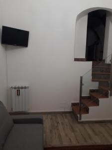 MAMARICO' APARTAMENT tesisinde bir televizyon ve/veya eğlence merkezi