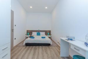 Posteľ alebo postele v izbe v ubytovaní Julia apartments