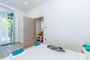 Posteľ alebo postele v izbe v ubytovaní Julia apartments