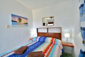 Postel nebo postele na pokoji v ubytování Villa Alégria