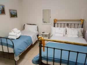Postel nebo postele na pokoji v ubytování Villa PANORAMA