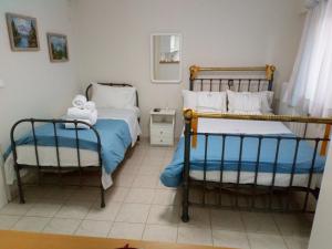 Postel nebo postele na pokoji v ubytování Villa PANORAMA