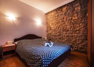 Llit o llits en una habitació de Apartments Vidilica