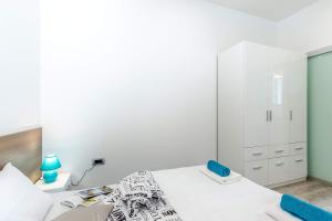 Posteľ alebo postele v izbe v ubytovaní Julia apartments