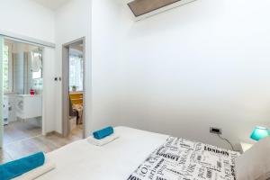 Posteľ alebo postele v izbe v ubytovaní Julia apartments