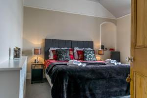 Ένα ή περισσότερα κρεβάτια σε δωμάτιο στο Tregortha Guest House