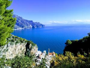a view from the top of a hill overlooking the ocean at Domus Gaia in Amalfi
