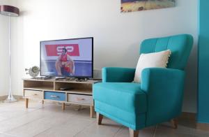 TV a/nebo společenská místnost v ubytování Casa del sole