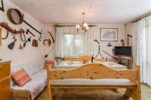 a living room with a couch and a table at Apartments Marija & Pepa in Rovinj