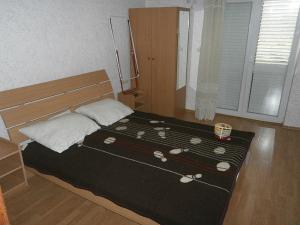 Postel nebo postele na pokoji v ubytování Apartments & Rooms Tony